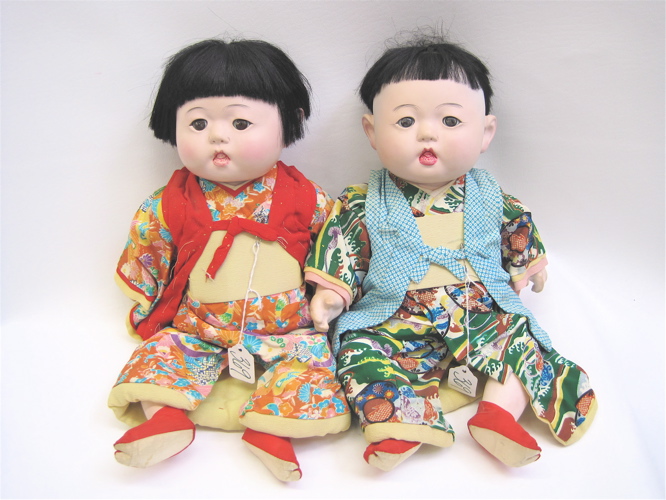 Appraisal: TWO JAPANESE TODDLER DOLLS a boy and girl each with