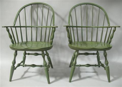 Appraisal: PAIR NICHOLS STONE GREEN PAINTED WINDSORS th century with curved