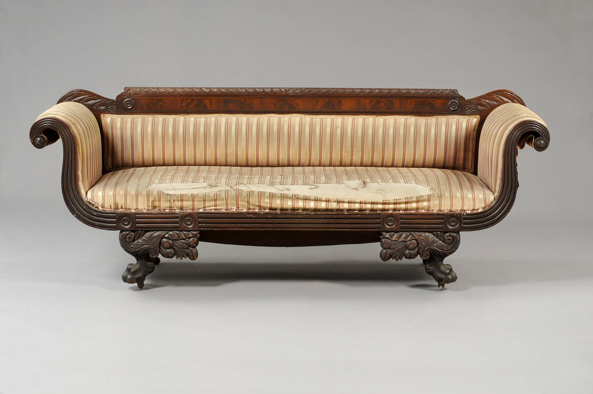 Appraisal: BOSTON CLASSICAL CARVED MAHOGANY SOFA The rectangular crest rail carved