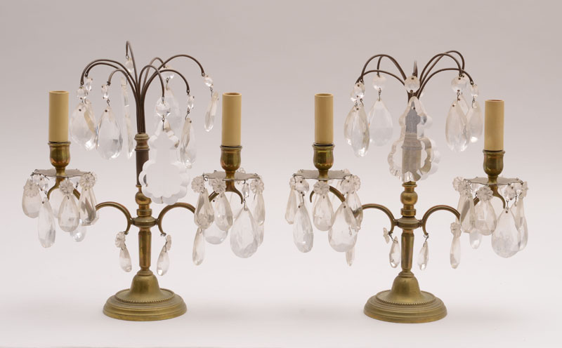 Appraisal: PAIR OF LOUIS XVI STYLE GLASS-MOUNTED BRASS TWO-LIGHT CANDELABRA Each