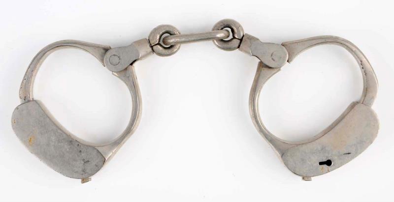 Appraisal: Bean Prison Handcuffs Patent No key Nice nickel finish Size