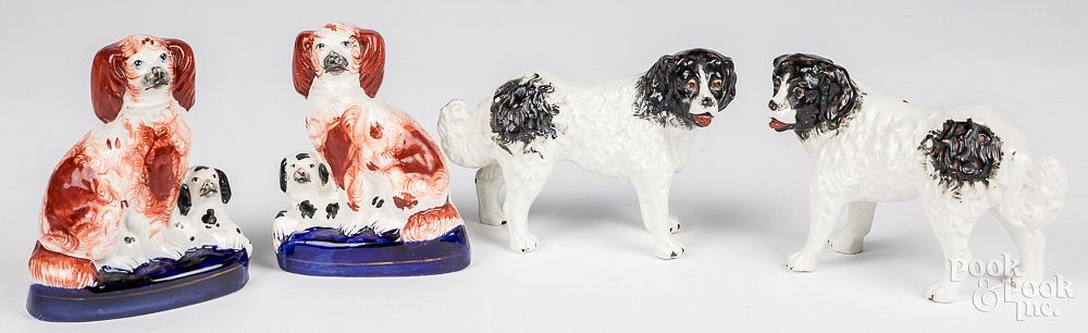 Appraisal: Pair of Staffordshire Saint Bernard dog figures Pair of Staffordshire