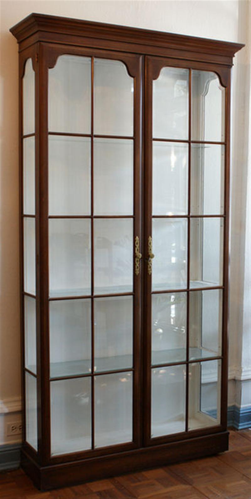 Appraisal: Mahogany Georgian style display cabinet two panel glazed front doors