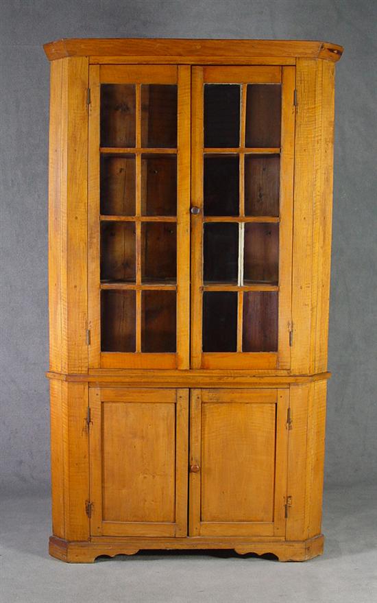 Appraisal: Figured Maple Corner Cupboard th Century Two eight-light doors above