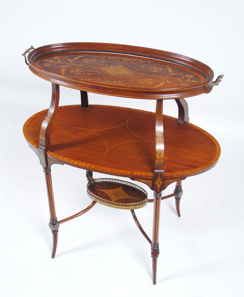 Appraisal: A LATE VICTORIAN MAHOGANY ETAGERE of oval graduated two tier