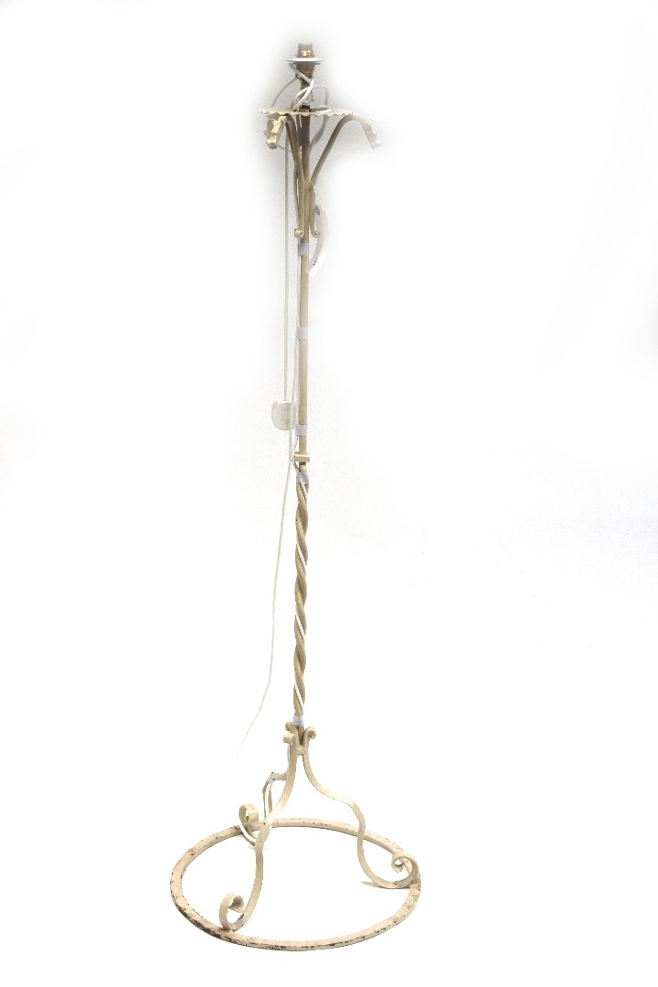 Appraisal: A wrought iron standard lamp th century the top with