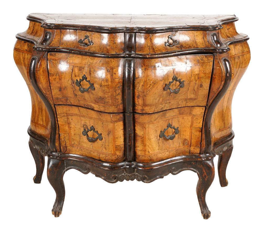 Appraisal: ITALIAN ROCOCO-STYLE WALNUT BOMBE COMMODEhaving four drawers Condition fading bubbling