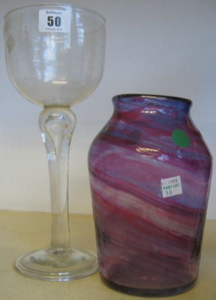 Appraisal: A tall glass wine glass th century with plain bowl