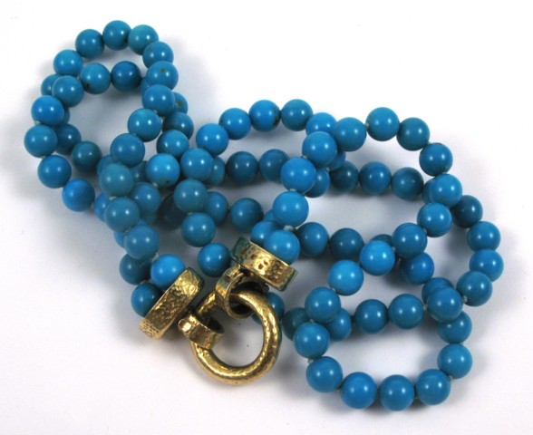 Appraisal: TURQUOISE AND YELLOW GOLD NECKLACE The double strand necklace is