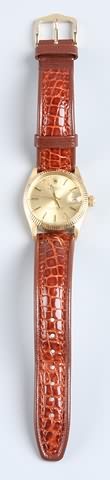 Appraisal: KY gold Rolex watch stamped K Leather band gold dial