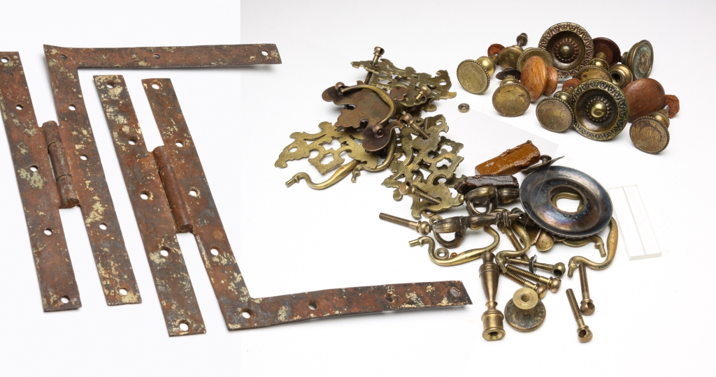 Appraisal: ASSORTED HARDWARE Nineteenth century Including drawer pulls knobs plaques and