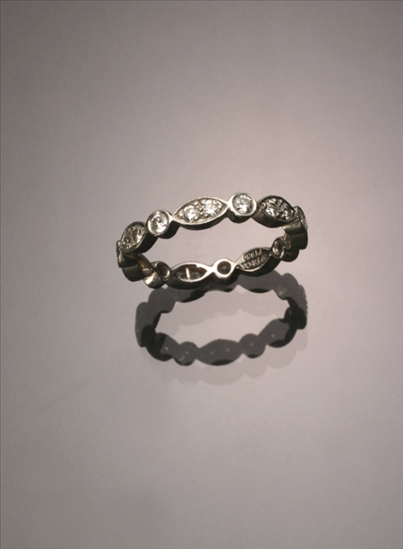 Appraisal: Platinum and Diamond Eternity Band Tiffany Co The bezel and