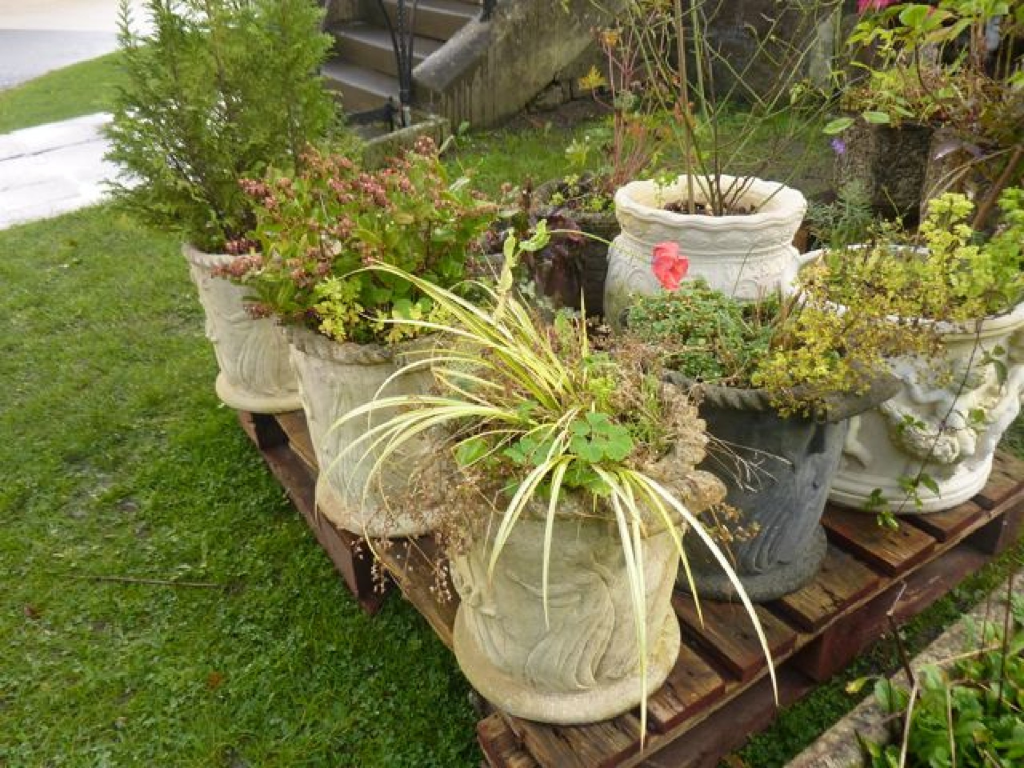 Appraisal: Four matching cast composition stone planters of circular form with