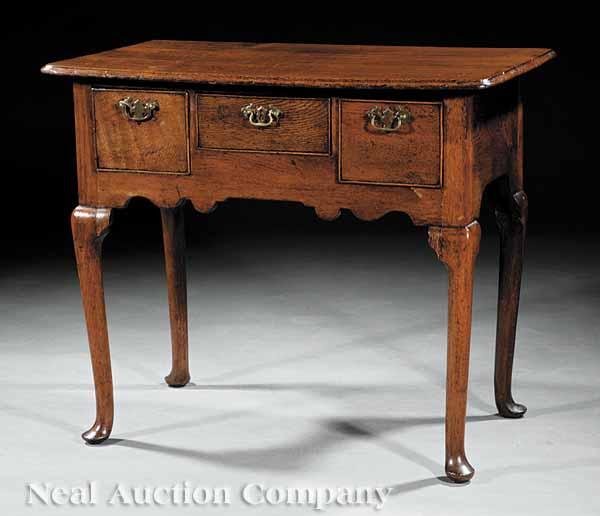 Appraisal: A Queen Anne Oak Dressing Table th c shaped top