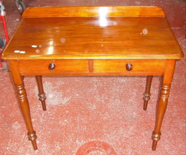 Appraisal: A late Victorian mahogany side table fitted with two drawers