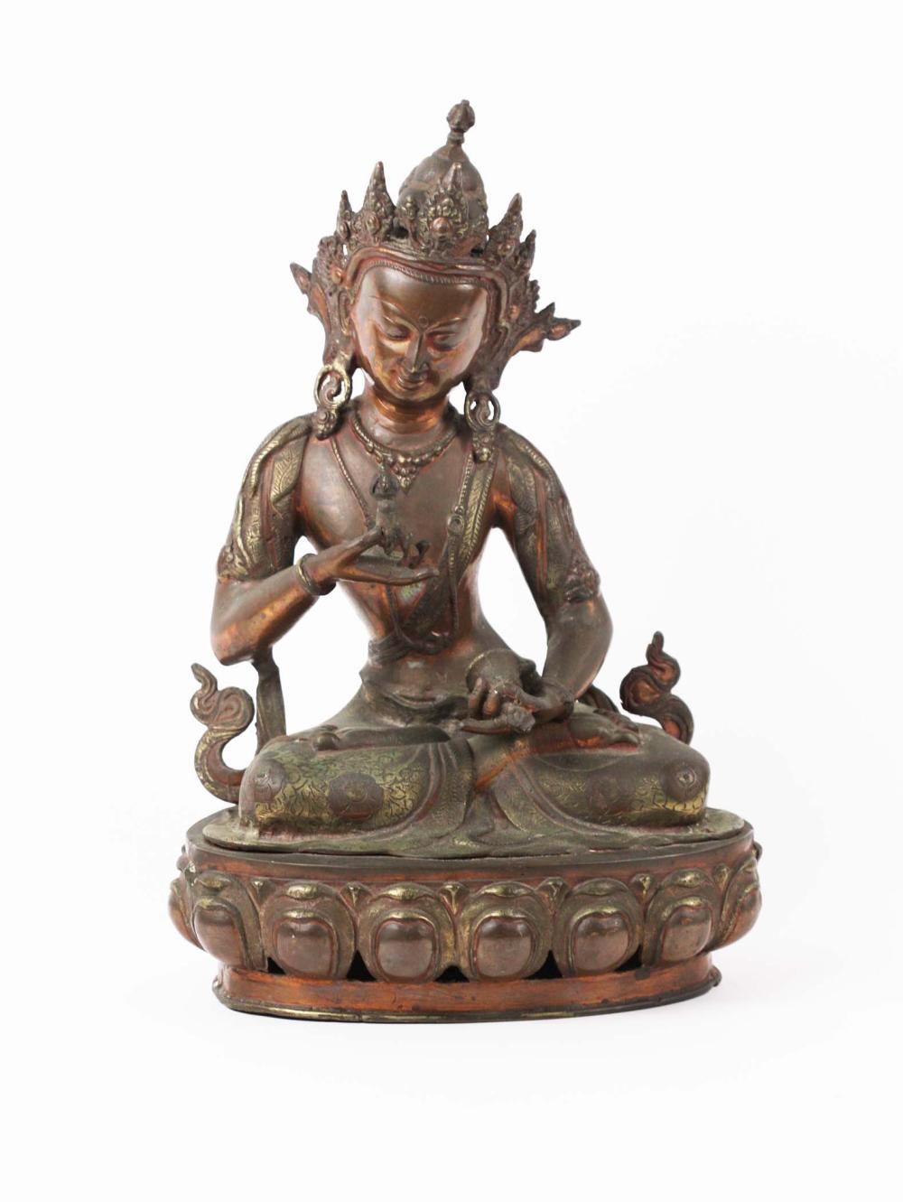 Appraisal: TIBETAN BRONZE SEATED FEMALE DEITYElaborately dressed wearing a crown atop