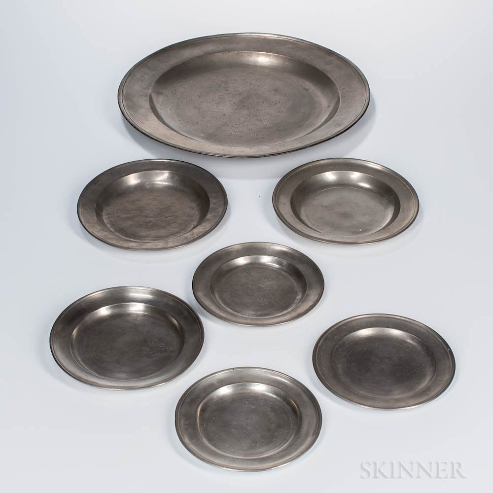 Appraisal: Six American Pewter Plates and a Charger Six American Pewter