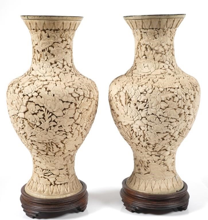 Appraisal: Pair mid th century carved white lacquer vases Resembling cinnabar