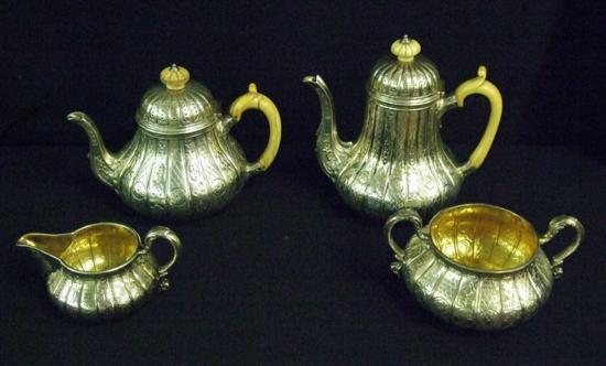 Appraisal: A VICTORIAN SILVER FOUR PIECE TEA AND COFFEE SERVICE each