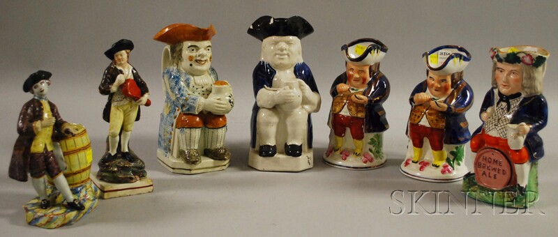 Appraisal: Five Staffordshire Toby Jugs a Figure and a Tin Glazed