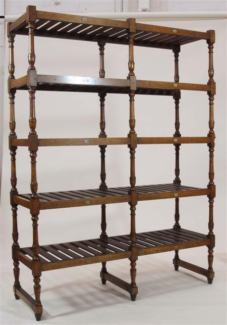 Appraisal: An early th century oak deed rack with five slatted