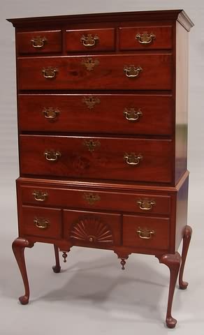 Appraisal: Walnut Three drawers over three graduated lipped drawers resting on