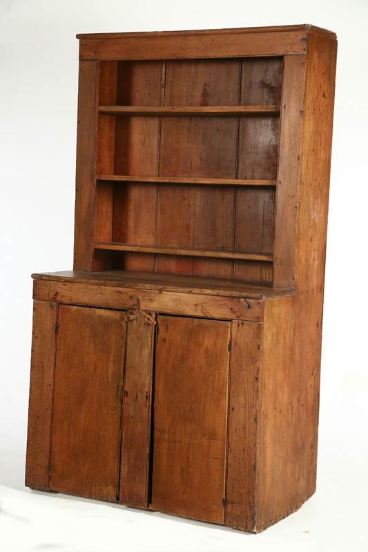 Appraisal: COUNTRY CUPBOARD American th century poplar One-piece stepback with old