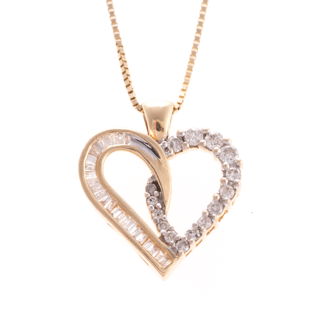 Appraisal: A Lady's Open Heart Diamond Pendant in Gold K yellow