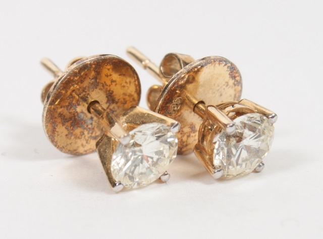 Appraisal: Pair of lady's K gold diamond earrings each presenting a