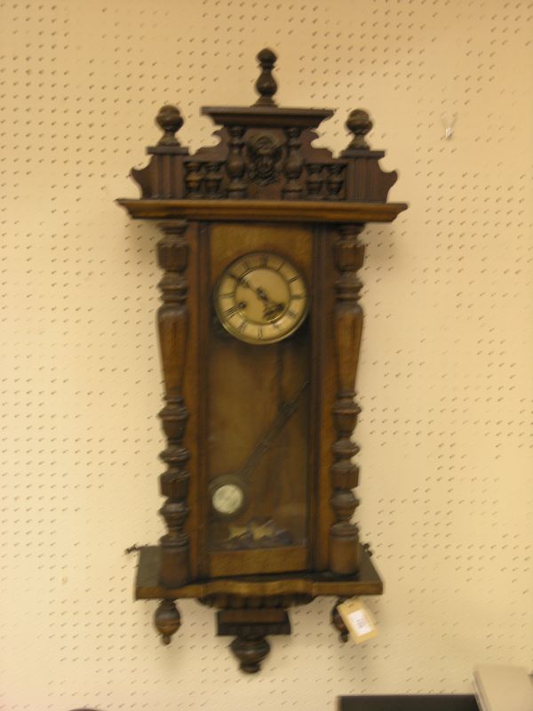 Appraisal: A mid th century German walnut wall clock architectural design