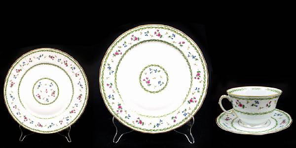 Appraisal: A Limoges porcelain dinner tea service in the 'Artois' pattern