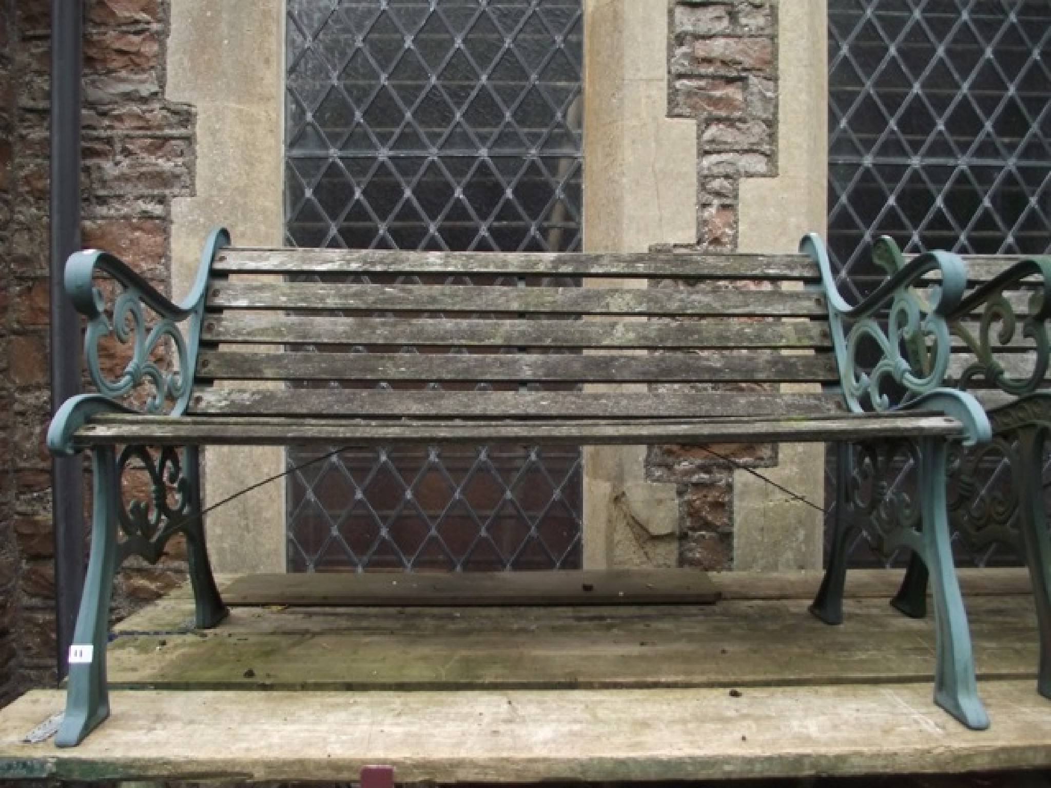 Appraisal: A pair of contemporary two to three seat garden benches