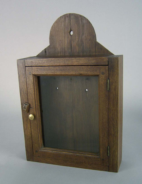 Appraisal: Pennsylvania walnut hanging wall cabinet early th c h w