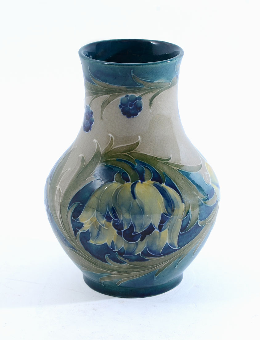 Appraisal: MOORCROFT GREEN ANEMONE VASE Squat vase with green and blue