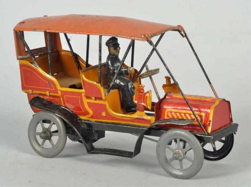 Appraisal: Tin Litho Automobile Wind-Up Toy German Working Original side lamps