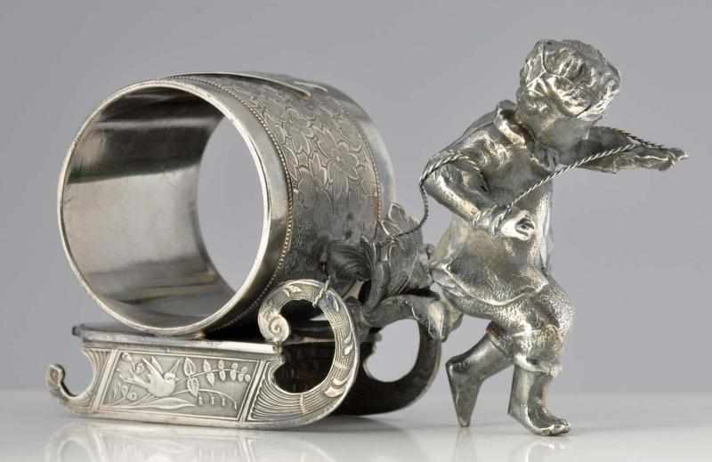 Appraisal: Boy Pulls Holder on Sled Figural Napkin Ring Wilcox Silver