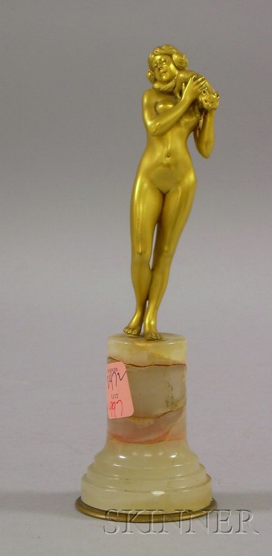 Appraisal: Continental Gilt Bronze of a Standing Female Nude with a