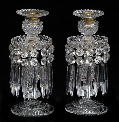 Appraisal: PAIR OF REGENCY CUT-GLASS CANDLESTICKS Each fluted orb stem with