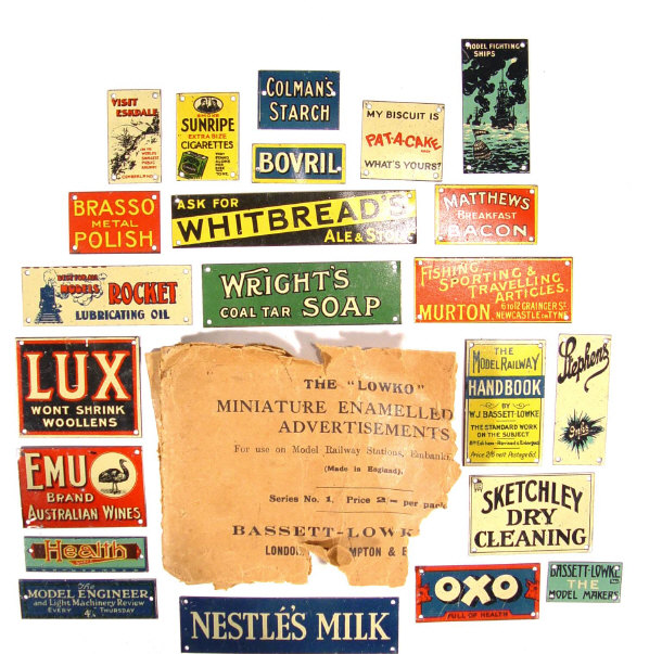 Appraisal: Group of Bassett-Lowke tin plate railway advertising signs for model