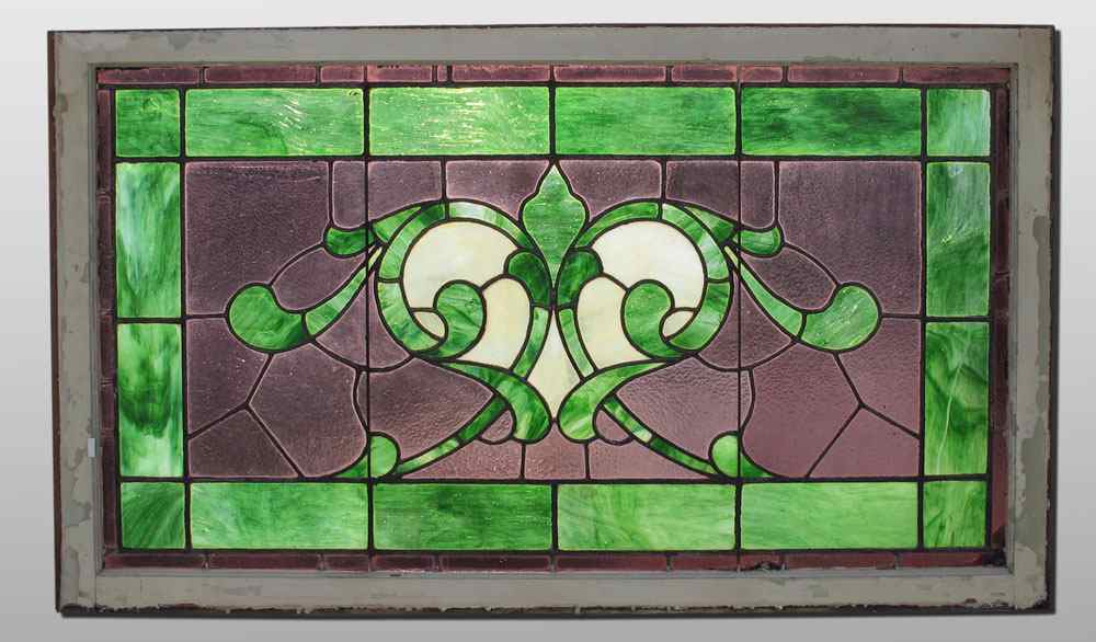 Appraisal: FOLIATE SCROLL STAINED GLASS WINDOW Featuring green red and white