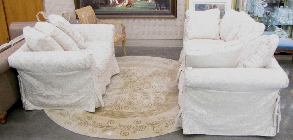 Appraisal: A sofa and a chair-and-a-half custom made by Expressions white