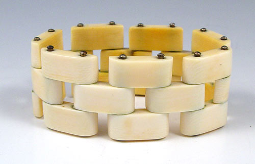 Appraisal: VINTAGE ' IVORY BRACELET Wide bracelet of hinged links with