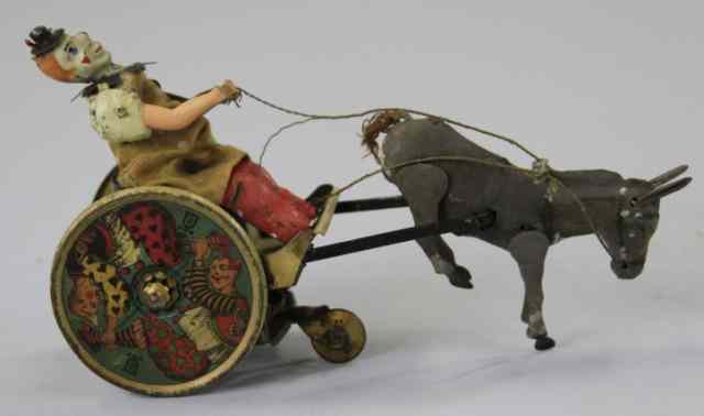 Appraisal: LEHMANN BALKY MULE Germany amusing depiction of clown riding cart