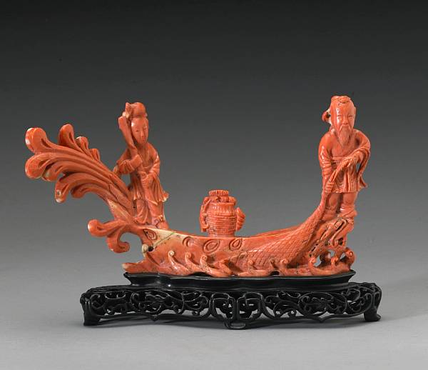 Appraisal: A pieced coral figural group th Century Depicting a fisherman