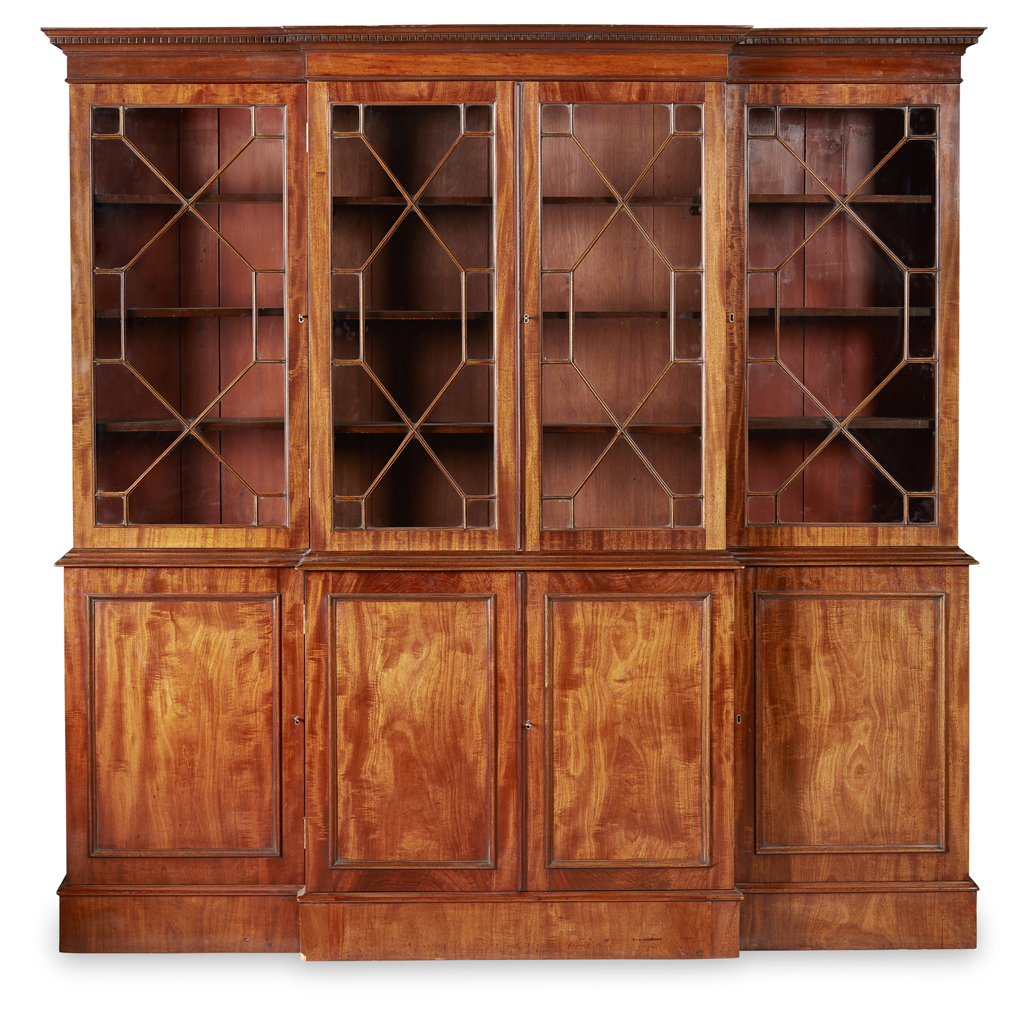 Appraisal: GEORGIAN STYLE MAHOGANY BREAKFRONT BOOKCASE EARLY TH CENTURY the dentil