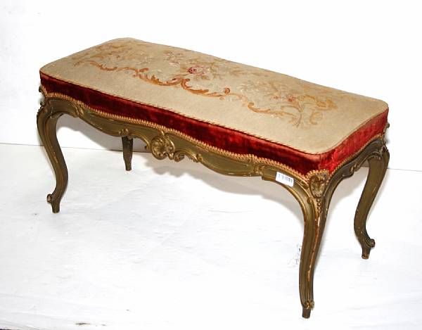 Appraisal: A Louis XV style giltwood tapestry upholstered bench first quarter