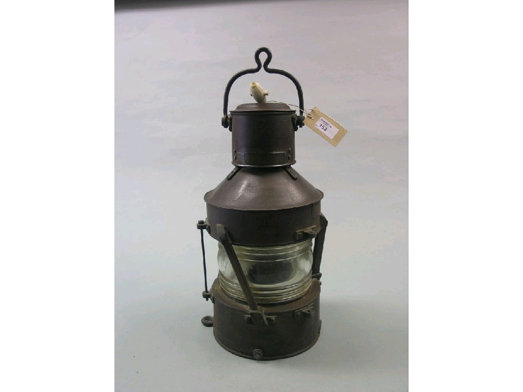 Appraisal: A Best Lloyd ship's lamp with iron carrying handle in