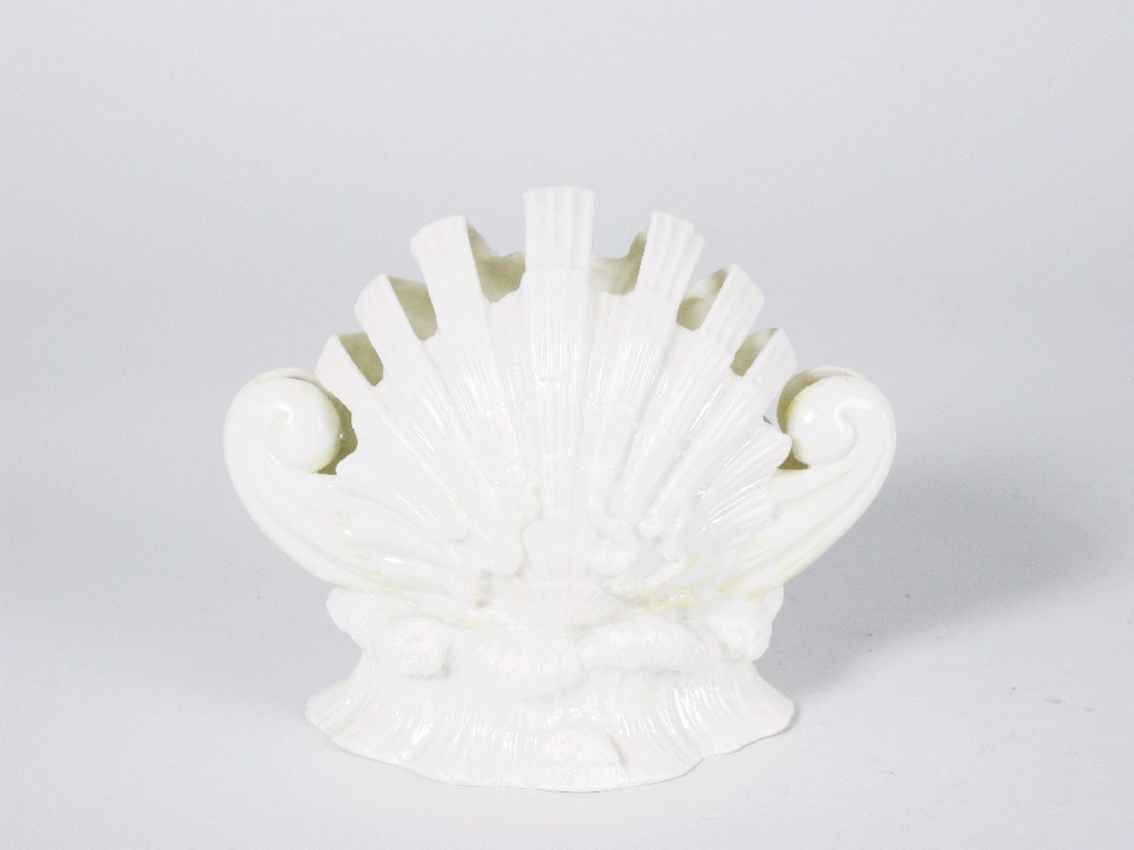 Appraisal: A Belleek Vase shell and coral moulded with yellow highlights