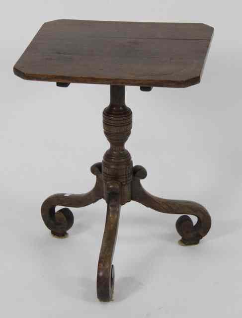 Appraisal: A th Century oak table the canted square top on