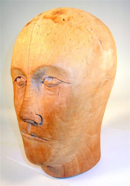 Appraisal: French carved fruitwood wig modelStamped 'Lou Per Garantie-Marke' to the